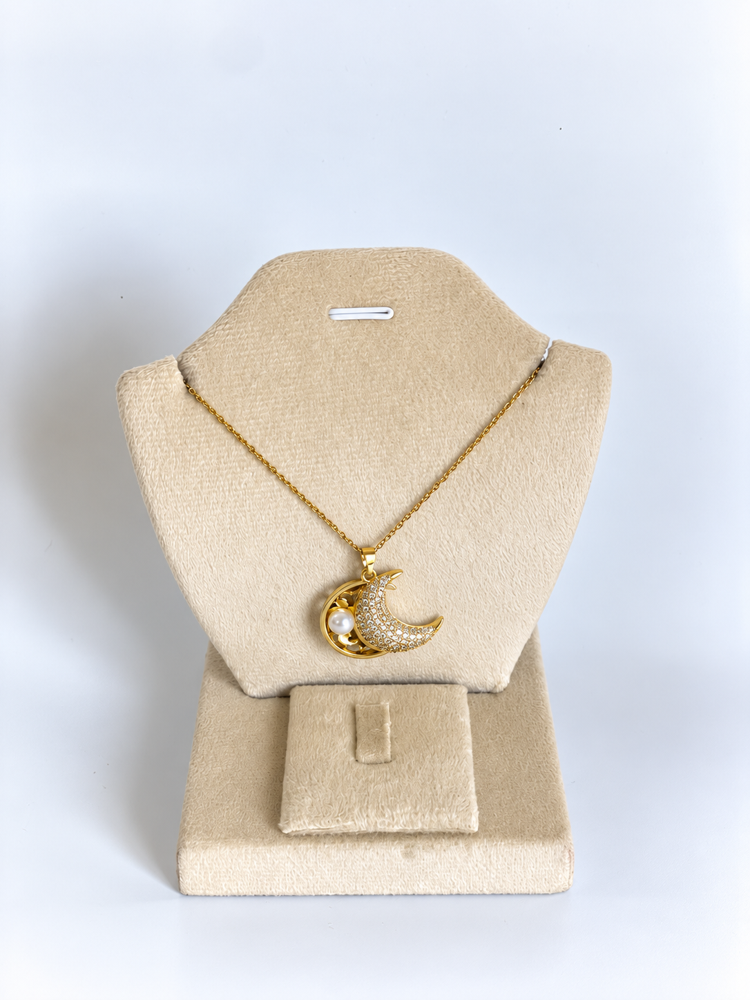 Gold Moon and Pearl Necklace on Velvet Bust